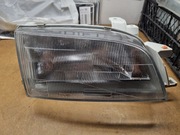LAMPA PRZÓD REFLEKTOR TOYOTA CARINA E 95- PRAWY TYC NOWY