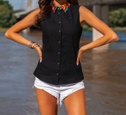 Koszula damska, kołnierzyk folk, kosztowała 119 zł.