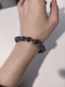 Bransoletka szara z papieru szara z Ugandy