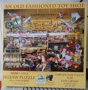 Puzzle 1000 SunsOut -AN OLD FASHIONED TOY SHOP