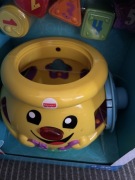 Garnuszek na klocuszek fisher-price