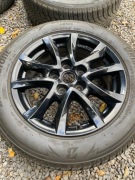 Koła Mazda felgi aluminiowe 16 z oponami zimowymi.