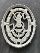 Żeliwny znak maszyny do szycia Singer