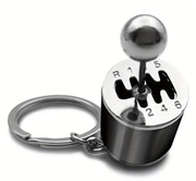 Elegancki Czarny Metalowy Brelok z Mini Skrzynią Biegów