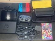 Nintendo Switch v2 + Pro Controller + Mario Cart 8 Deluxe + Futerał