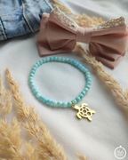 Bransoletka z masy perłowej ze złotą zawieszką żółwiem ze stali szlachetnej