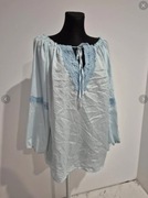 Błękitna luźna niebieska koszula koronka wiązana połyskująca