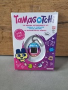 Tamagotchi Bandai interaktywne zwierzątko Gen1 rainbow tęczowe