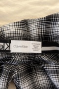 Spodnie piżamowe Calvin Klein w klasycznym czarno-białym wzorze w kratę