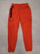 Czerwone pomarańczowe spodnie Project X Paris S 36 ok. 146 - 152 jak nowe