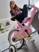 Dziecięcy różowy rowerek marki B’Twin 14" + dzwonek, kijek i kółka