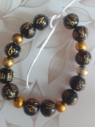 Bransoletka damska rękodzieło na sznurku.