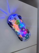 ŚWIECĄCY PRZEZROCZYSTY SAMOCHÓD MUZYCZNY YJ TOYS GRA ŚWIECI JEŹDZI