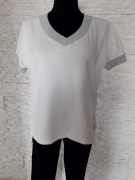 Miała bluzka ze srebrnymi dodatkami