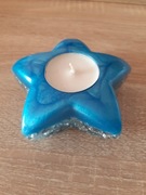 Świecznik na podgrzewacze z żywicy. Gwiazda ze srebrnymi dodatkami 