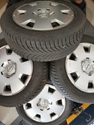 Komplet kół zimowych Opel opony zimowe R16 felgi kołpaki śruby 