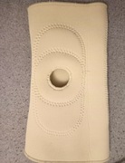 Bandaż na kolano tym