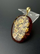 Srebrny wisiorek z naturalnego bursztynu bałtyckiego z inkluzją owada.