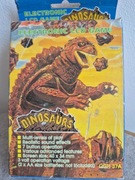 DINOSAURS   ELEKTRONICZNA GIERKA VINTAGE LATA 90