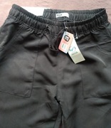 Spodnie dziewczęce 146/152 cm.