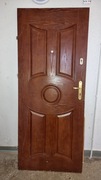 Sprzedam drzwi wejściowe, zewnętrzne - skrzydło, kolor brązowy.