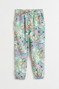 H&M Spodnie Joggersy Tkaninowe Zielone w Motyle i Kwiaty Rozmiar 122