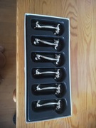 Koziołki. Podstawki pod sztućce - koty. Francja