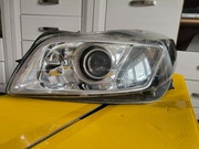 REFLEKTOR LEWY LAMPA PRZÓD BIXENON SKRĘTNY OPEL INSYGNIA  A ROK 2011