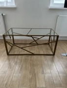 Stolik kawowy szklany ze złotymi zdobieniami Beliani 