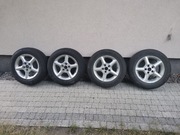 4 oryginalne felgi aluminiowe z oponami 185/65 R 14 do Toyoty