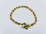 Bransoletka na gumce z pszczółką/pszczołą z modeliny fimo 