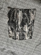 Top w skórę węża