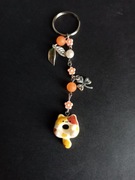 Brelok kot donut pączkot pomarańczowy rudy liście 