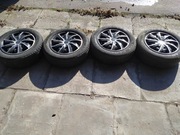 Felgi  stalowe z oponami zima 185/60/ R14 + kolpaki