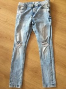 spodnie jeansy  damskie z rozdarciami fsbn  denim 32/32