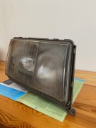 Oryginał - Reflektor Mercedes w 124 prawy przód Hella