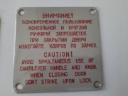 Metalowa plakietka bezpieczenstwa z samolotu Tu154