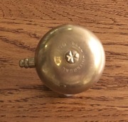 Mosiężny dzwonek Universal