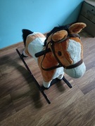 Brązowy koń na biegunach z melodią Baby Mix 