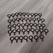 Kółka z żabkami plastikowe do karnisza brązowe