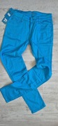 < WYPRZEDAŻ > UROCZE NIEBIESKIE  SPODNIE  38. NOWE