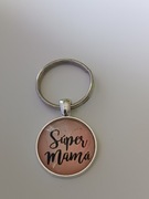 Brelok , breloczek , wypukłe szkło..