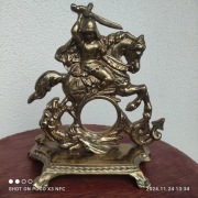 Oprawa do zegara lub na fotografię z brązu -rycerz na koniu