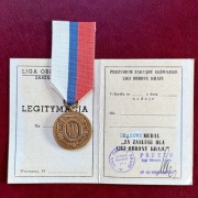 Brązowy Medal za zasługi dla LOK legitymacja PRL