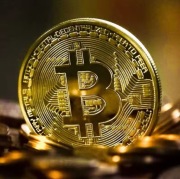 Moneta bitcoin złota 