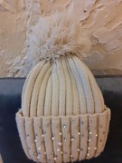 Czapka zimowa dziewczęca kremowa z dużym pomponem