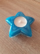 Świecznik na podgrzewacze z żywicy. Gwiazda ze srebrnymi dodatkami 