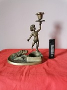 Swiecznik mosiężny Kobieta z psem 