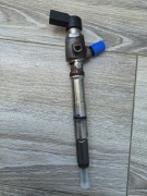 Wtryskiwacz 03l130 277b  VW Passat B7 1.6 tdi