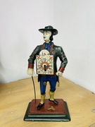 Zegar figuralny ,, Sprzedawca Zegarów „